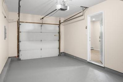 8 Hilltop Ave, West Babylon, NY 11704 - garage featuring a garage door opener
