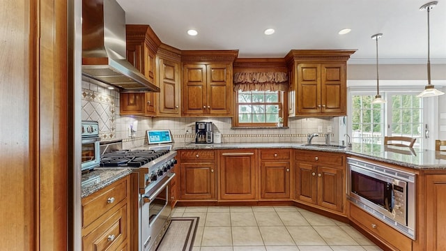 5 Long House Way, Commack, NY 11725 - kitchen featuring wall chimney exhaust hood, appliances with stainless steel finishes, a sink, brown cabinetry, and recessed lighting