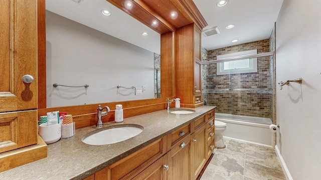 5 Long House Way, Commack, NY 11725 - bathroom featuring baseboards, toilet, enclosed tub / shower combo, double vanity, and recessed lighting