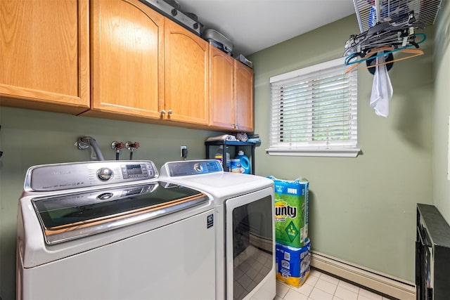 30 Apple Hill Dr, Cortlandt Manor, NY 10567 - laundry room with a baseboard radiator, washer and dryer, cabinet space, and light tile patterned flooring
