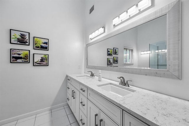 30 Apple Hill Dr, Cortlandt Manor, NY 10567 - full bathroom featuring double vanity, baseboards, tile patterned flooring, and a towering ceiling