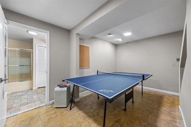 30 Apple Hill Dr, Cortlandt Manor, NY 10567 - playroom with baseboards and stone finish flooring