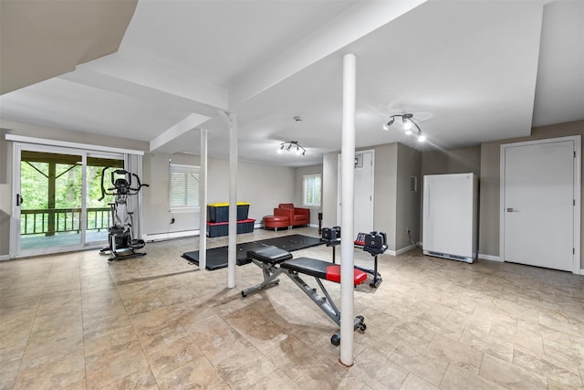30 Apple Hill Dr, Cortlandt Manor, NY 10567 - exercise room featuring a baseboard heating unit and baseboards