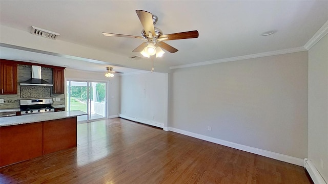 unfurnished living room featuring a baseboard radiator, baseboards, ornamental molding, wood finished floors, and ceiling fan