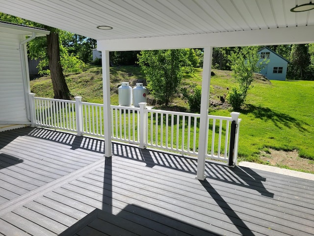 deck featuring a lawn