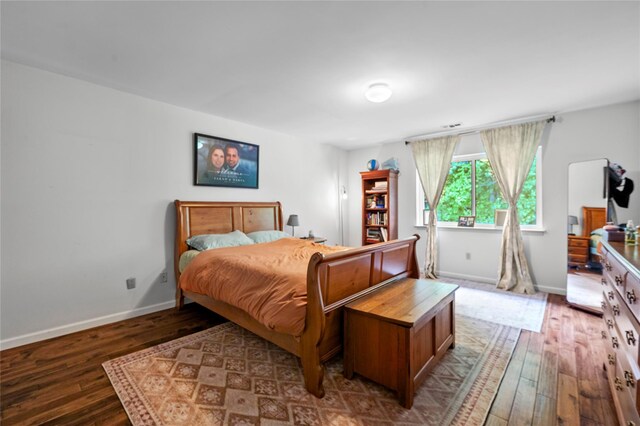 324 N Greeley Ave, Chappaqua, NY 10514 - bedroom with wood-type flooring and baseboards