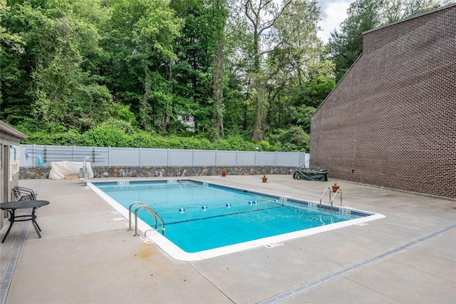 324 N Greeley Ave, Chappaqua, NY 10514 - community pool with fence and a patio