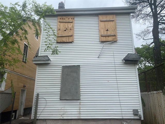 205-28 116th Rd, Saint Albans, NY 11412 - view of property exterior featuring fence