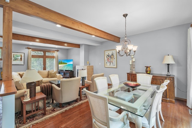 dining area featuring recessed lighting, wood finished floors, a chandelier, and beam ceiling