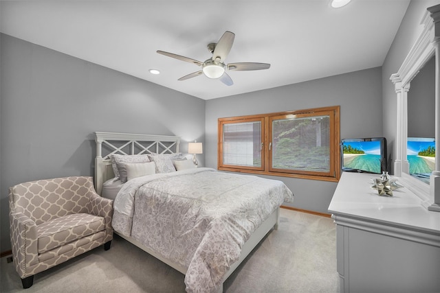 bedroom featuring light carpet, recessed lighting, ceiling fan, and baseboards