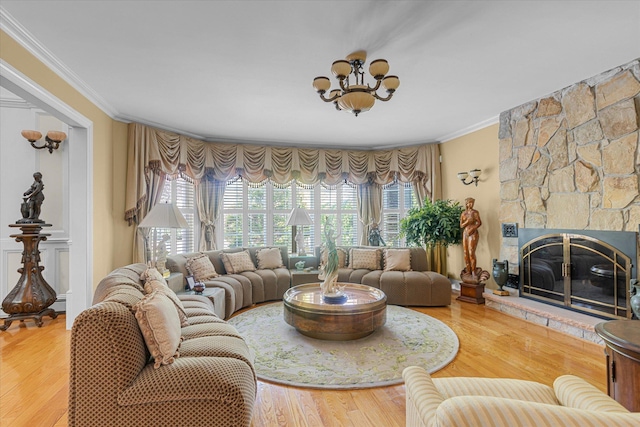 4 Point Cres, Malba, NY 11357 - living area featuring ornamental molding, a chandelier, a stone fireplace, and wood finished floors