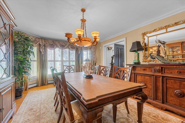 4 Point Cres, Malba, NY 11357 - dining space with a chandelier, plenty of natural light, crown molding, light wood-style floors, and baseboard heating