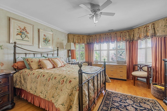 4 Point Cres, Malba, NY 11357 - bedroom with multiple windows, ornamental molding, light wood-style floors, and a ceiling fan