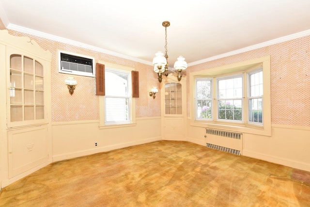 50 Fordham St, Williston Park, NY 11596 - unfurnished dining area with radiator heating unit, wallpapered walls, ornamental molding, a chandelier, and wainscoting