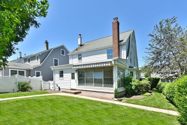 50 Fordham St, Williston Park, NY 11596 - back of house featuring a chimney