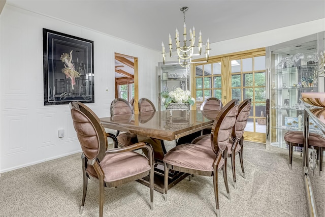 11 Kings Gate Rd, Suffern, NY 10901 - dining room with light carpet and a chandelier