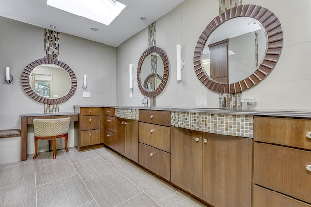 11 Kings Gate Rd, Suffern, NY 10901 - bathroom with a skylight and double vanity