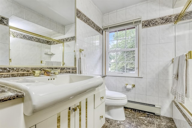 11 Kings Gate Rd, Suffern, NY 10901 - full bath featuring a baseboard heating unit, tile walls, toilet, a sink, and a tile shower