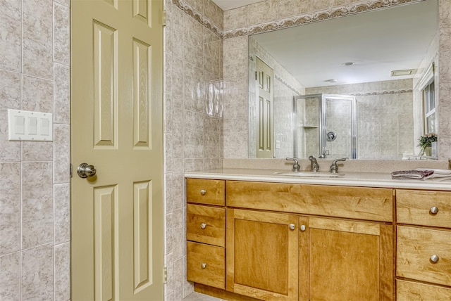 11 Kings Gate Rd, Suffern, NY 10901 - bathroom with tile walls, vanity, and a shower with door