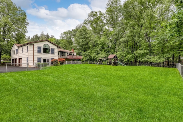 11 Kings Gate Rd, Suffern, NY 10901 - view of yard with a playground and asphalt driveway