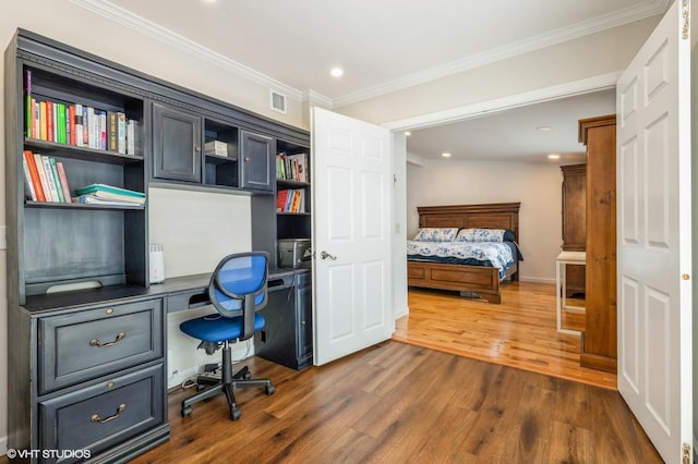 150 Arthur St, Massapequa Park, NY 11762 - bedroom with dark wood-style flooring, crown molding, and recessed lighting