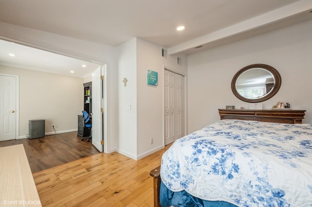150 Arthur St, Massapequa Park, NY 11762 - bedroom with wood finished floors, recessed lighting, and baseboards