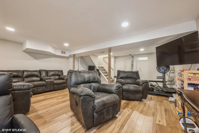 150 Arthur St, Massapequa Park, NY 11762 - living room featuring light wood finished floors, stairway, and recessed lighting