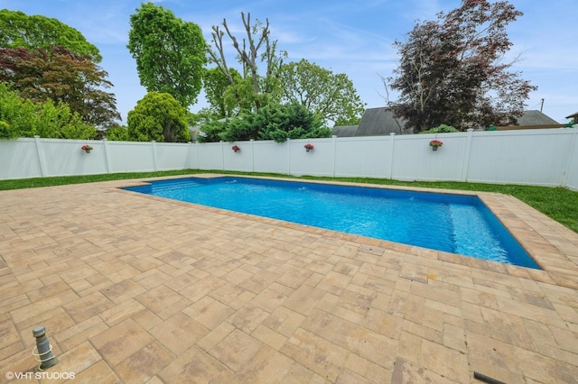 150 Arthur St, Massapequa Park, NY 11762 - view of swimming pool featuring a patio and a fenced backyard
