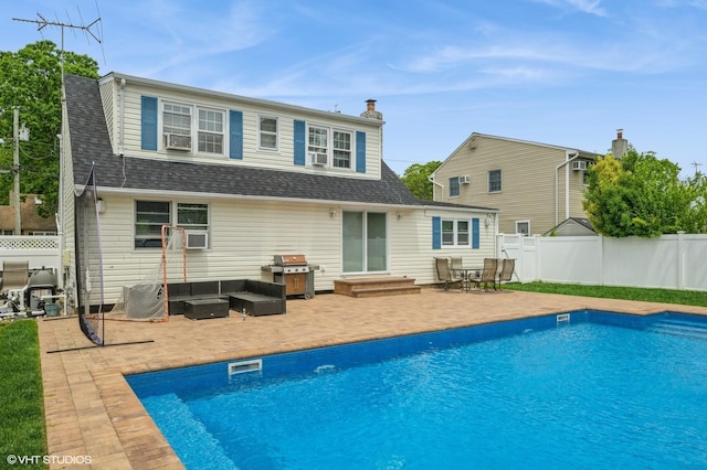 150 Arthur St, Massapequa Park, NY 11762 - back of property with entry steps, a patio area, a fenced backyard, and roof with shingles