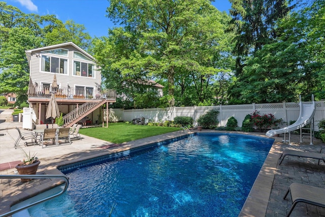 41-27 Orient Ave, Douglaston, NY 11363 - view of pool featuring a water slide, stairway, a patio, and a deck