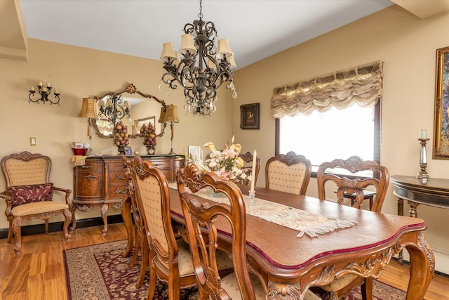41-27 Orient Ave, Douglaston, NY 11363 - dining area featuring a chandelier and light wood-style floors