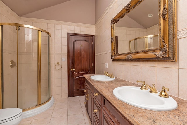 41-27 Orient Ave, Douglaston, NY 11363 - bathroom with lofted ceiling, a shower stall, tile walls, tile patterned floors, and double vanity