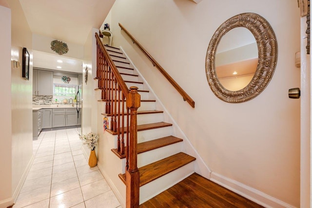 2588 Stedman Pl, Bronx, NY 10469 - stairway featuring baseboards and tile patterned flooring