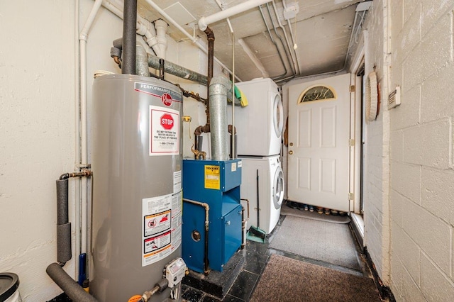 2588 Stedman Pl, Bronx, NY 10469 - utility room with stacked washing machine and dryer and water heater