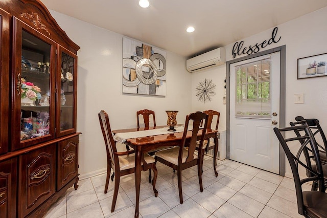 2588 Stedman Pl, Bronx, NY 10469 - dining area with a wall unit AC, light tile patterned floors, and recessed lighting