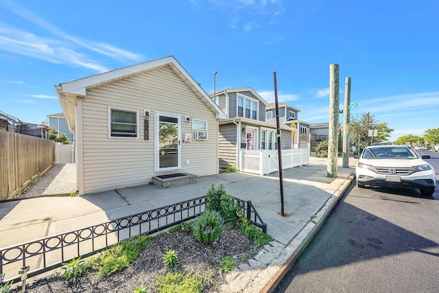 1203 Cross Bay Blvd, Broad Channel, NY 11693 - view of front of house featuring fence