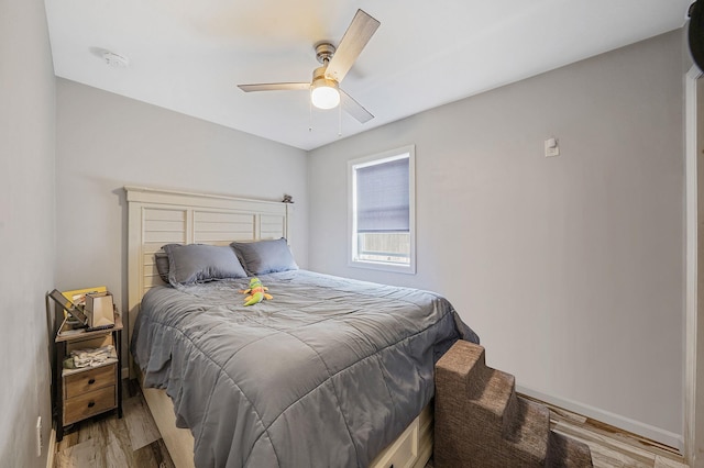 1203 Cross Bay Blvd, Broad Channel, NY 11693 - bedroom featuring light wood finished floors, ceiling fan, and baseboards