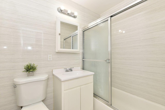 4 Birchwood Ct Unit 2K, Mineola, NY 11501 - full bath with toilet, vanity, and combined bath / shower with glass door