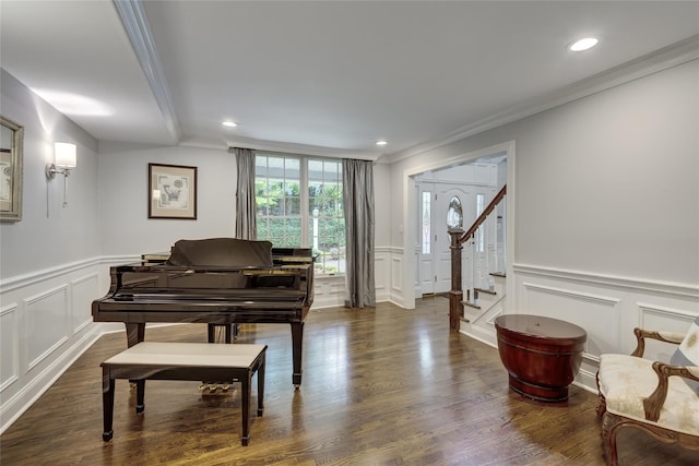 14 Rockwood Rd W, Manhasset, NY 11030 - living area with a decorative wall, crown molding, wainscoting, dark wood-type flooring, and stairway