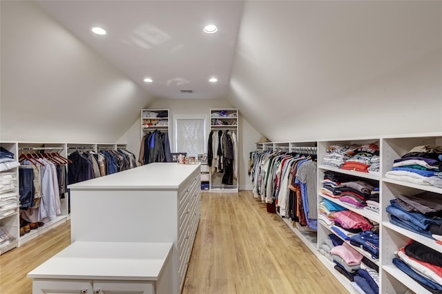 14 Rockwood Rd W, Manhasset, NY 11030 - spacious closet with light wood-style flooring and vaulted ceiling