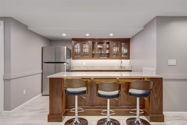 14 Rockwood Rd W, Manhasset, NY 11030 - indoor wet bar featuring freestanding refrigerator, recessed lighting, and baseboards