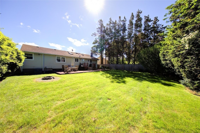 55 Richfield St, Plainview, NY 11803 - view of yard with a fire pit and a deck