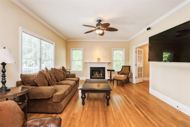 30 Lawrence Rd, Kings Park, NY 11754 - living room with ceiling fan, wood finished floors, plenty of natural light, baseboards, and ornamental molding