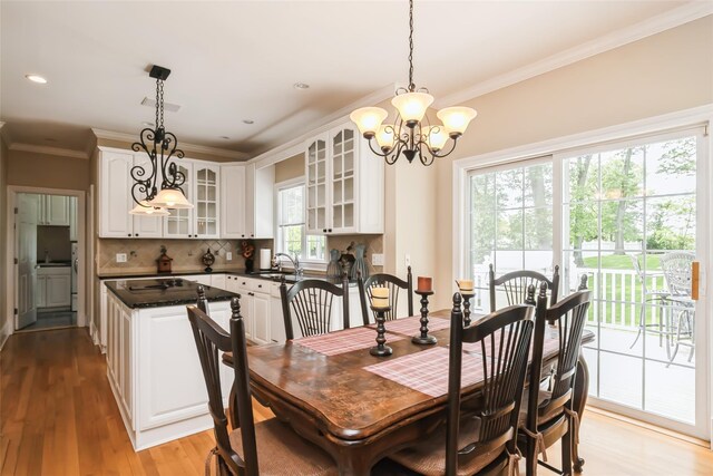 30 Lawrence Rd, Kings Park, NY 11754 - dining area with a chandelier, ornamental molding, light wood finished floors, and recessed lighting