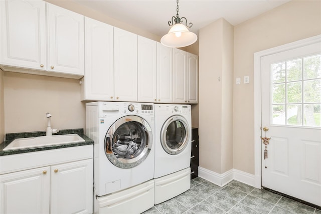 30 Lawrence Rd, Kings Park, NY 11754 - laundry room with washing machine and clothes dryer, cabinet space, baseboards, and light tile patterned floors