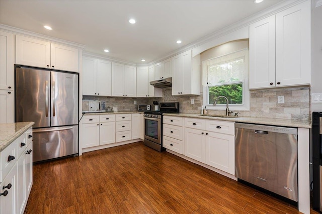 4200 Rocky Point Rd, East Marion, NY 11939 - kitchen featuring stainless steel appliances, a sink, dark wood-style floors, white cabinetry, and recessed lighting