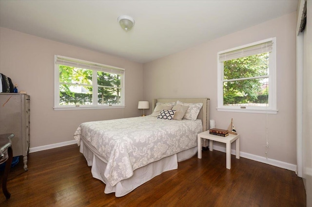 4200 Rocky Point Rd, East Marion, NY 11939 - bedroom featuring wood finished floors, multiple windows, and baseboards