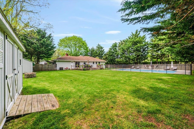 4200 Rocky Point Rd, East Marion, NY 11939 - view of yard featuring an outdoor fire pit and a wooden deck