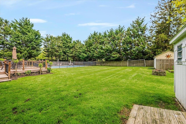 4200 Rocky Point Rd, East Marion, NY 11939 - view of yard with a deck, a pool, and an outdoor fire pit