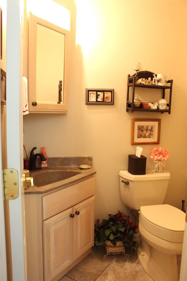 1 Rose Ct, East Islip, NY 11730 - half bath with toilet, vanity, and tile patterned floors